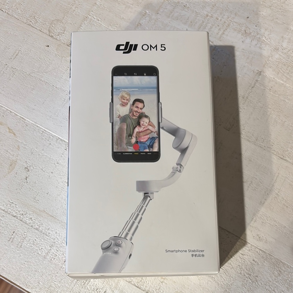 DJI Gray Smartphone Gimbal Stabilizer for Smooth Video